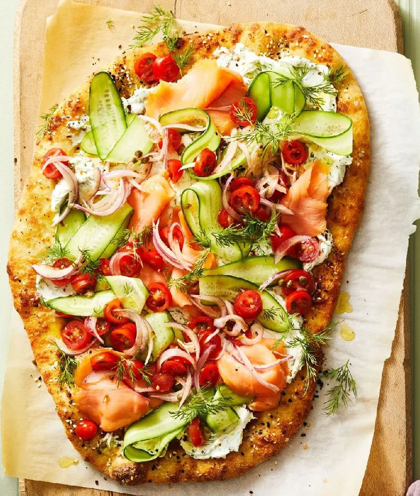 Skip the bagel and prepare this flatbread topped with your favorite ingredients.