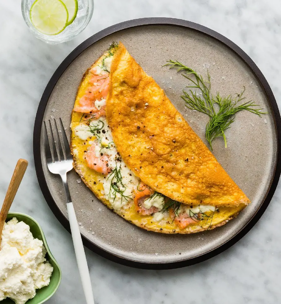 Salmon omlettes with dill, zucchini and bacon is a magical dish with savoury flavor.