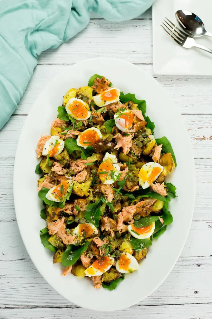 A delicious smoked salmon with eggs and smashed mustard potatoes is perfect for brunch or lunch.