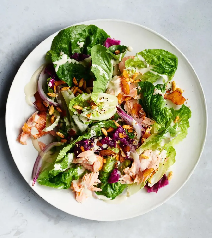 Spicy hot-smoked salmon slaw can be dressed with ingredients of your choice.