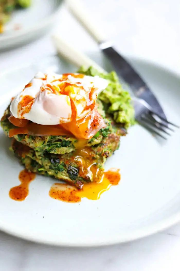 Zucchini fritters along with smoked salmon and poached eggs is a crispy as well as healthy dish you can add to your favorite meal.