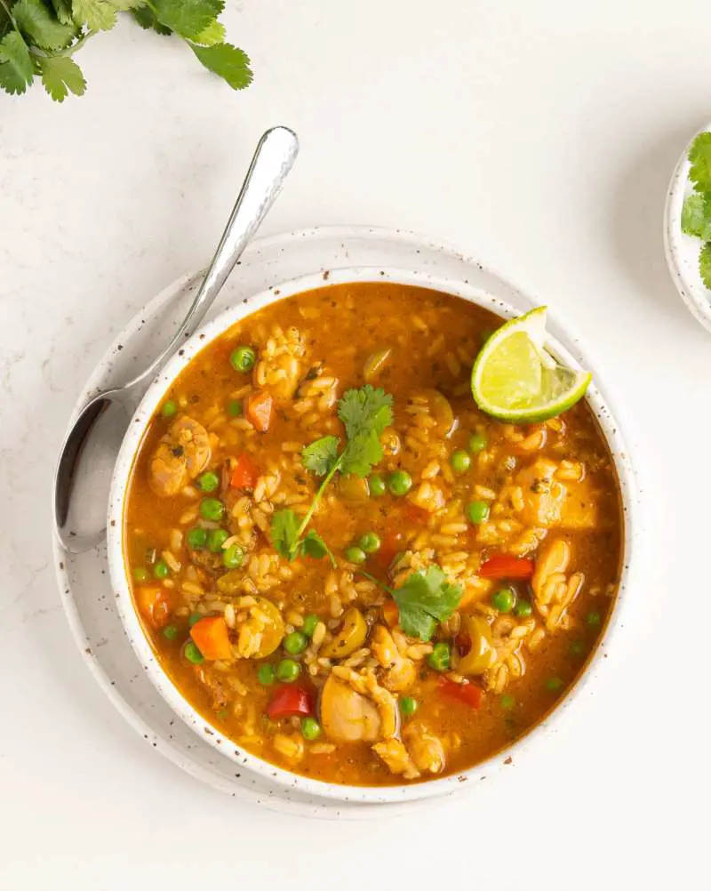 Asopao de Pollo is a hearty Puerto Rican chicken stew made with sofrito, adobo seasoning, lots of veggies and rice