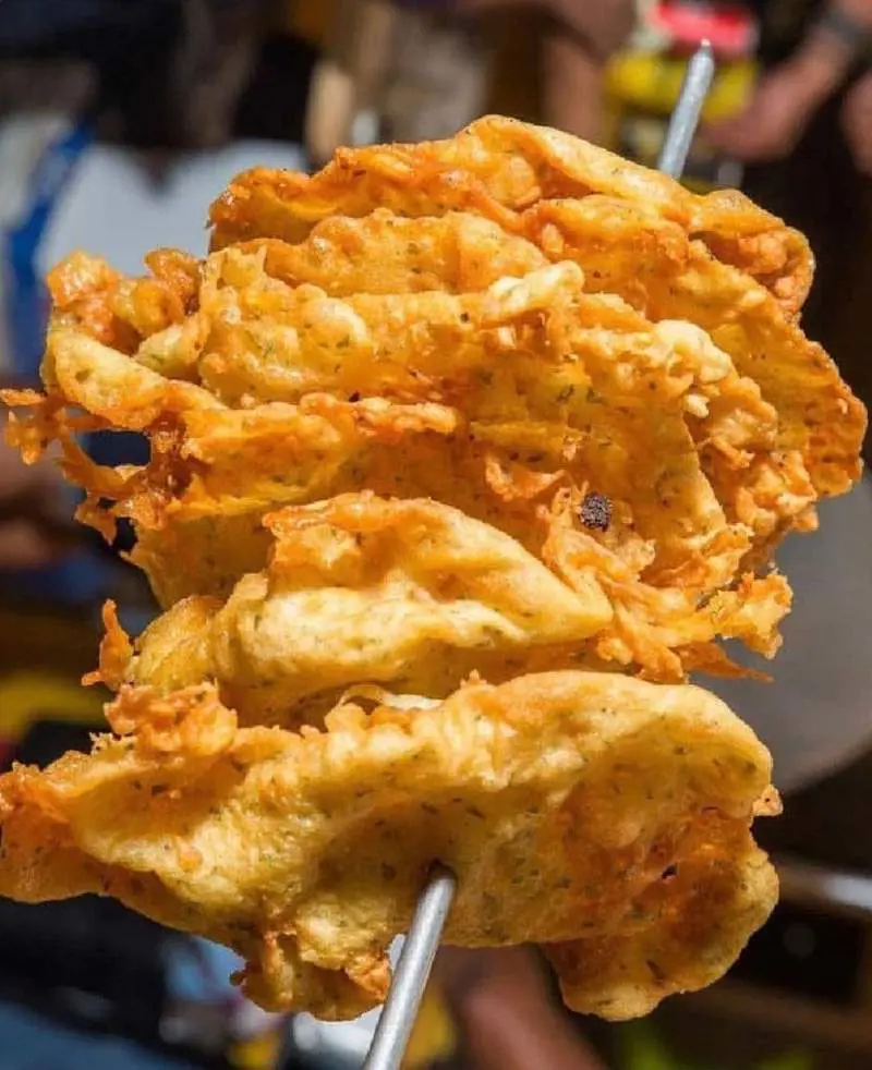 Bacalaito is a traditional Puerto Rican snack usually served at the beach, cuchifritos, and at festivals