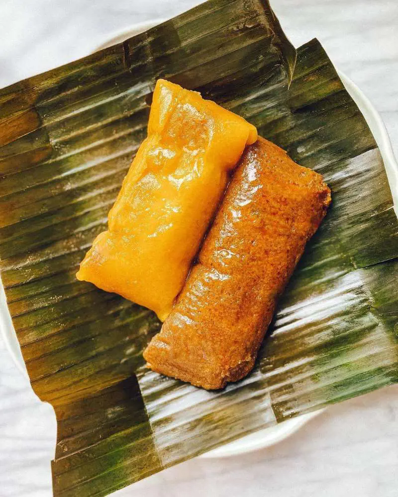 Pastel is a traditional Puerto Rican dish made with a type of green plantain or cassava, filled with pork, and wrapped in a plantain leaf