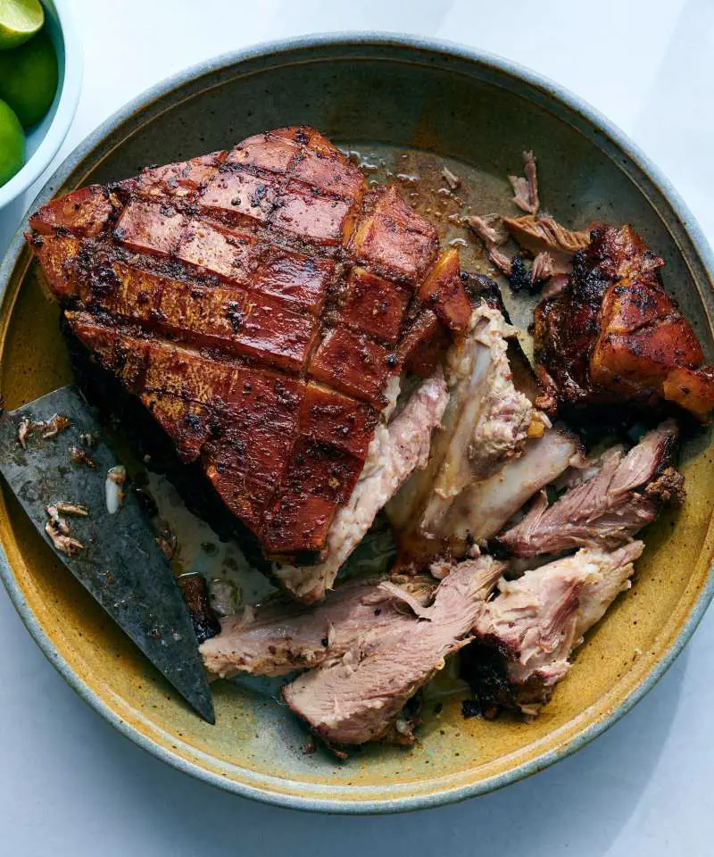Pernil is a slow-roasted marinated pork leg or pork shoulder served during the holidays but it can be enjoyed year round